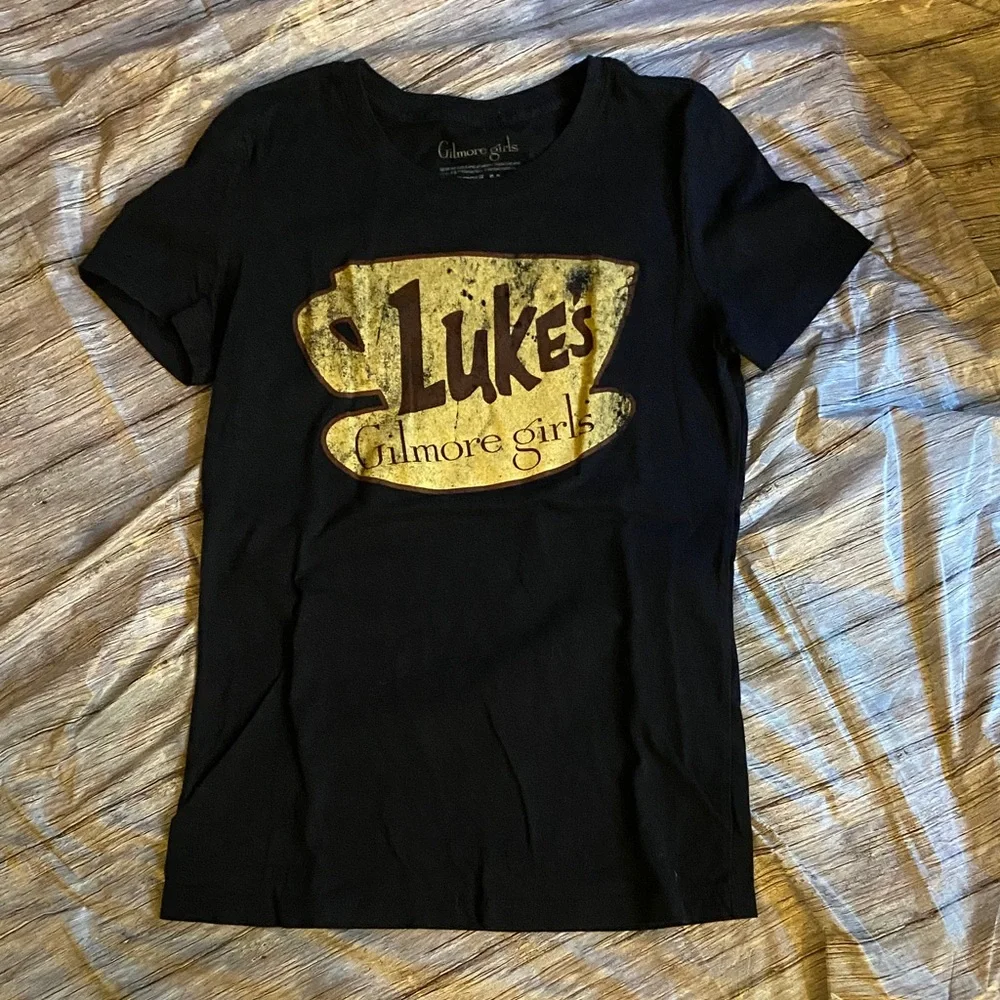 Gilmore Girls Black Tee with Gold Luke's Coffee Shop Design - Picture 4 of 5